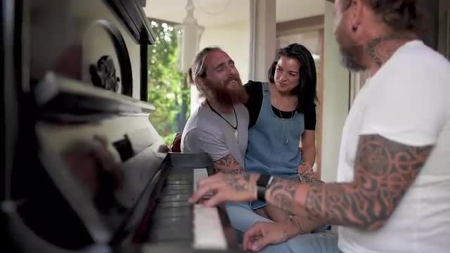 Playing piano and singing