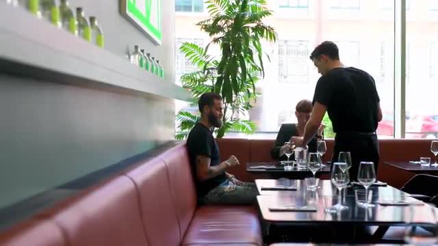 Bartender serving guests
