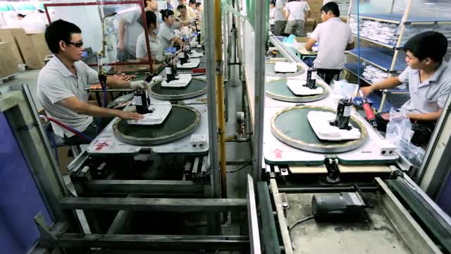 Assembly line factory workers, China, Asia