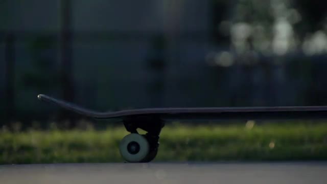 Picking Up Skateboard in Slow Motion