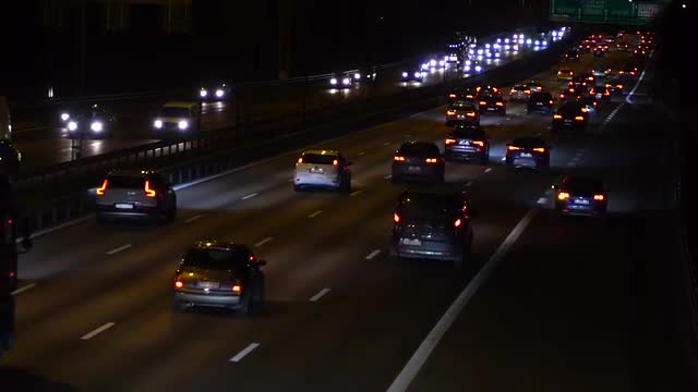 slow motion shot - evening traffic on highway in Stockholm