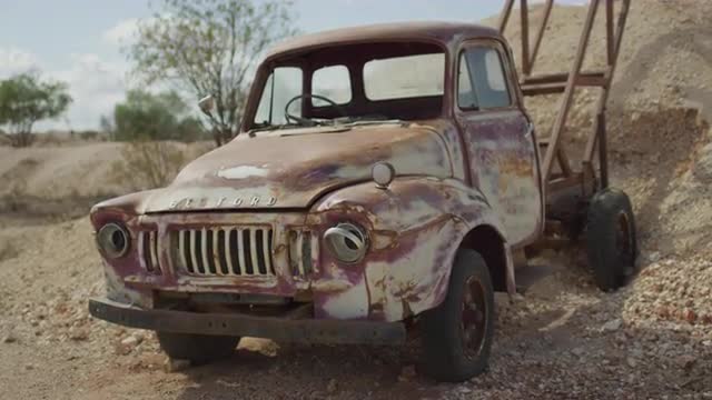 Old rusty opal mining truck in outback australia