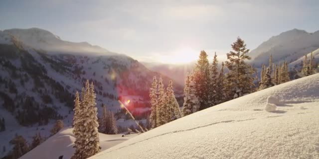 Sunny day in snowy mountains