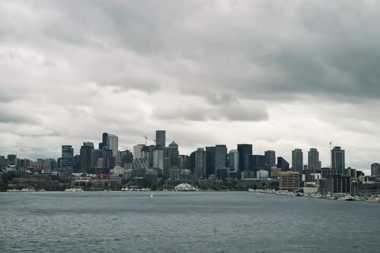 Timelapse of Seattle Skyline with Dramatic Cloudy Overcast over Lake Union from Gasworks Park