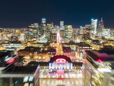 Aerial Hyperlapse over Union Station in Downtown Denver at Night with Traffic