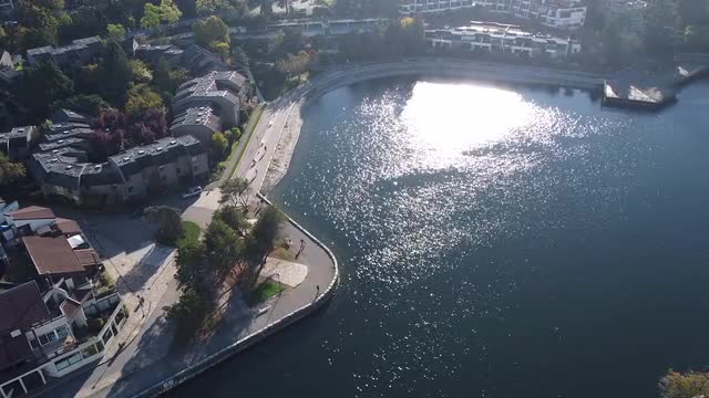 Top down view of yachts docked in the small marina