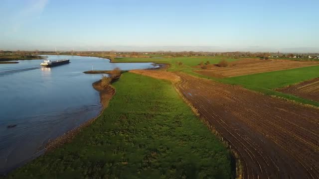 Fields and river on summer day, Lopikerkapel, Utrecht, Netherlands
