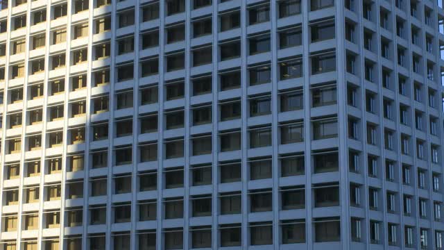 Time lapse Los Angeles sunrise shadow office building California USA