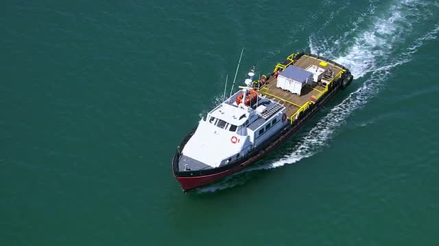 Aerial shot of fishing boat in ocean