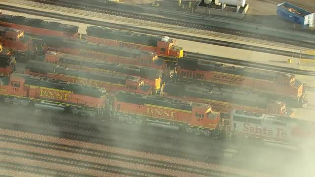 Los Angeles, California, USA - March 22, 2012: Aerial shot of the train engines and smoke