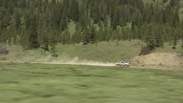 CineFlex of Truck Approaching Mountains_02