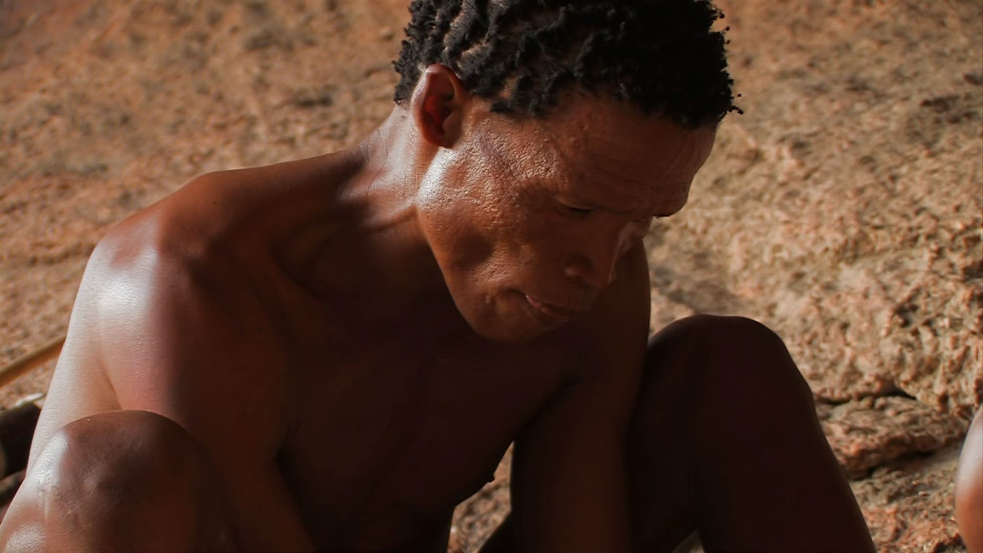 863379878 / San / Making Fire / Namibia
