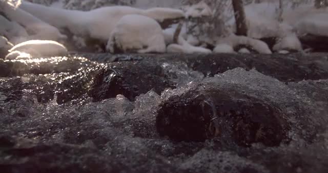 Water Pours Over Icy Rocks_02