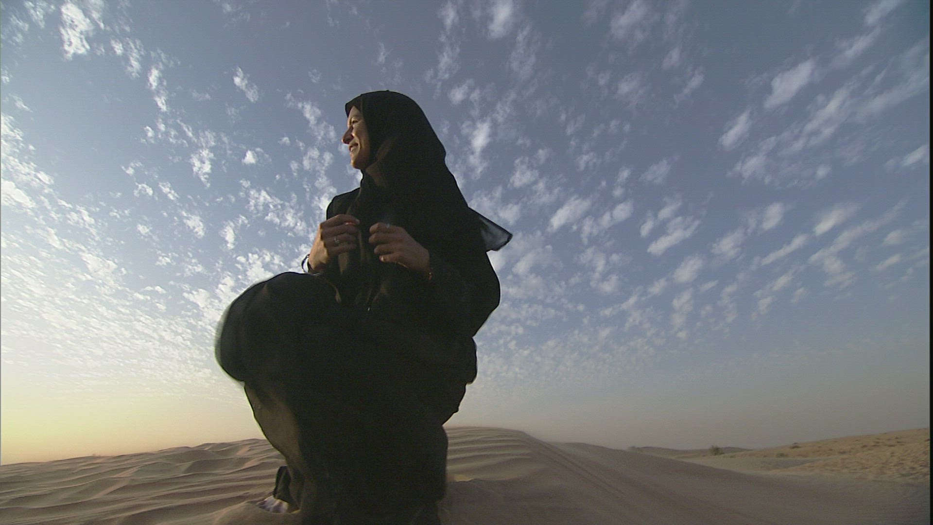 780969813 / Woman / Veil / Desert / United Arab Emirates