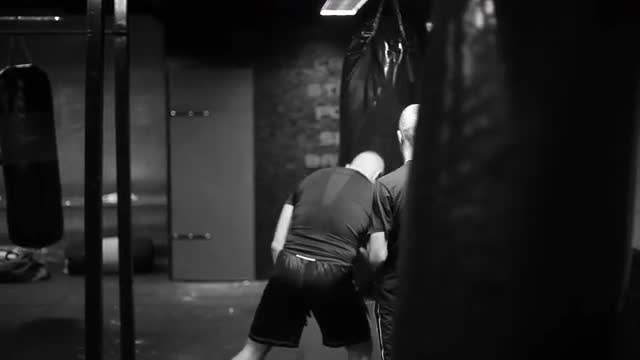 Young Box student practices on the punching bag