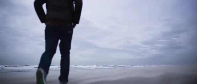 Walking on windy beach