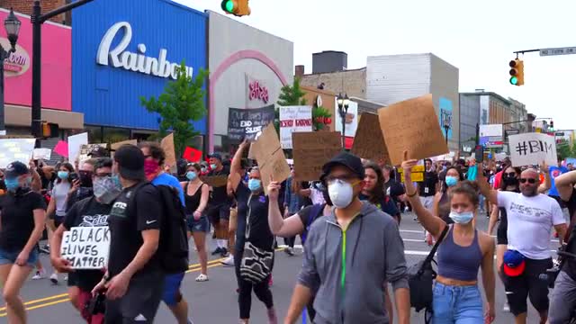 View of People Marching at a Black Lives Matter March 
