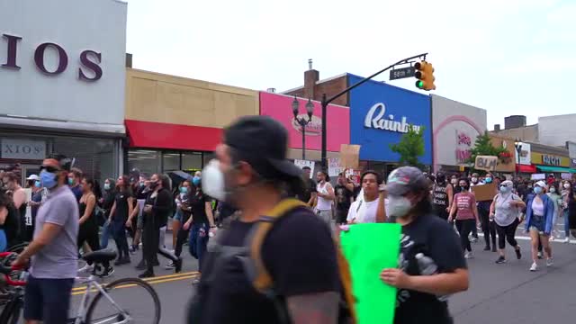 View of People Marching at a Black Lives Matter March 