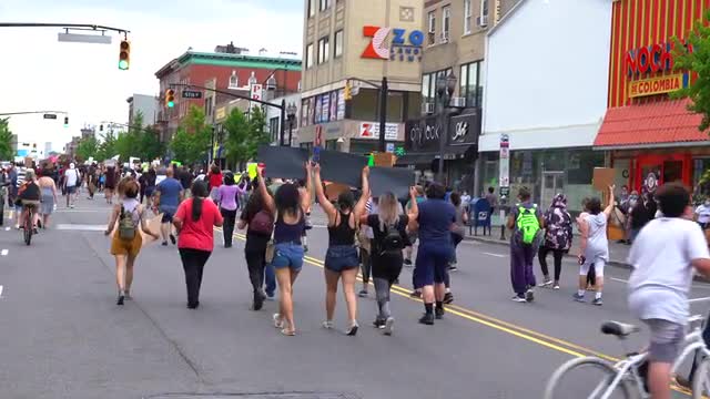 View of People Marching at a Black Lives Matter March 