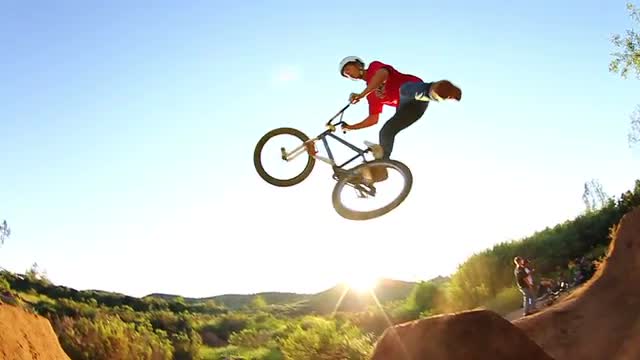 Slow Motion Extreme BMX Bik Rider Doing Tail Whip