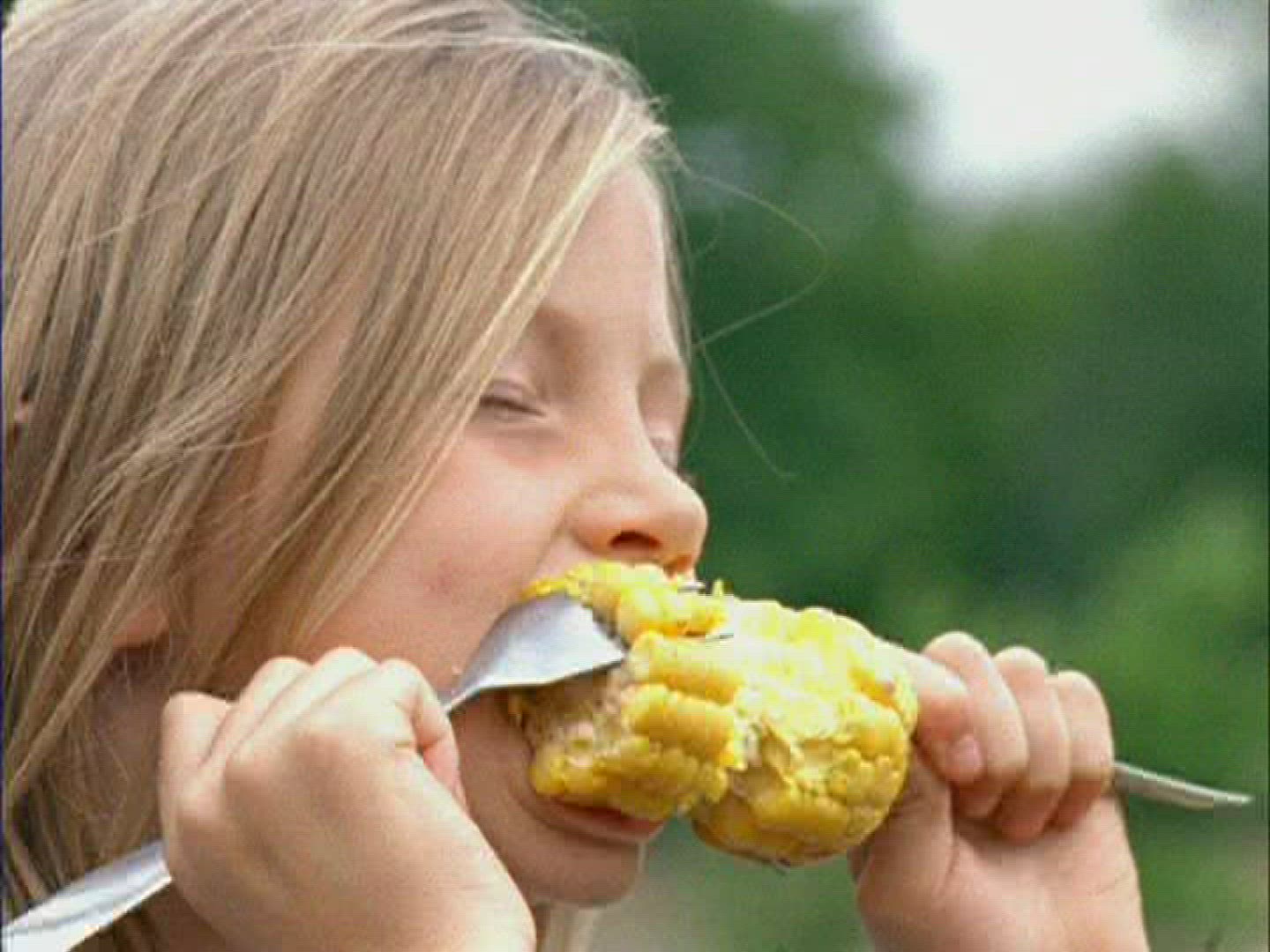 798527853 / Girl / Eating / Grimace / Germany