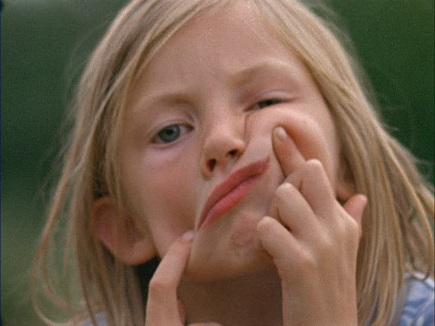 931078901 / Girl / Eating / Grimace / Germany