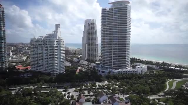 Extended Aerial Fly Over from Ocean to Continuum- Miami Beach Luxury Condo (penthouse)
