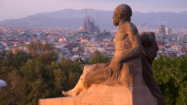 View across Barcelona Spain with statue foreground.