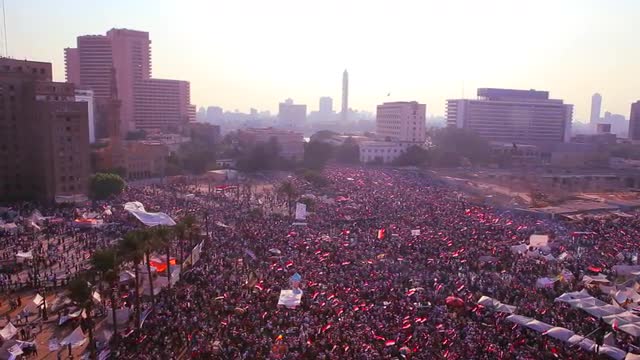 Overhead view as protestors jam Tahrir Square in Cairo, Egypt in the early morning hours.