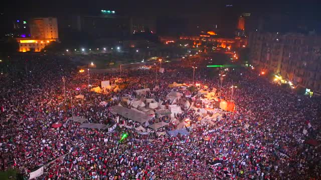 View overlooking an enormous nighttime rally in Tahrir Square in Cairo, Egypt.