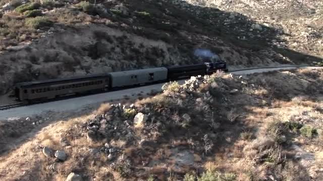 A train passes through a remote region.