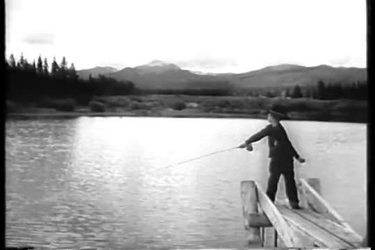President Eisenhower spends time golfing and fishing with his grandson in Colorado in 1955.