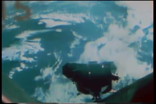 Footage of the Apollo 9 mission to test the Command-Service Module and Lunar Module in preparation f