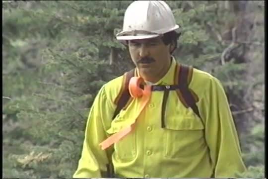 Firemen are taught how to set backfires in this 1980s.