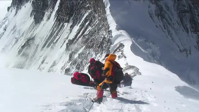 Climbers stuck and turning back in high winds