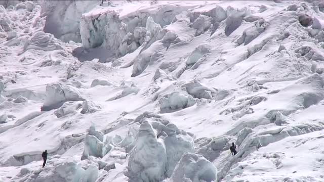 Climbers in the icefall