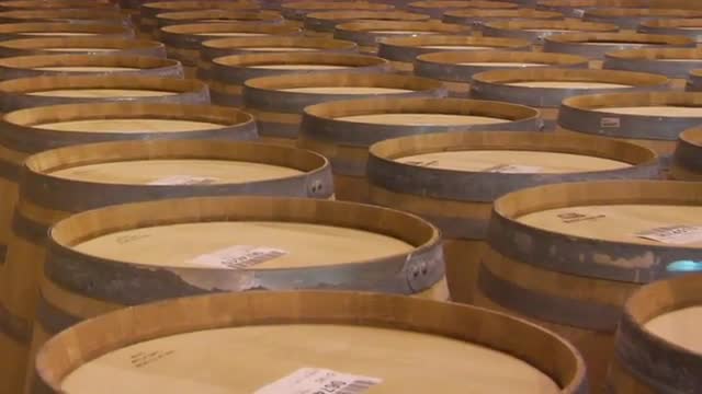 Wine barrels in a Santa Barbara County winery, California.
