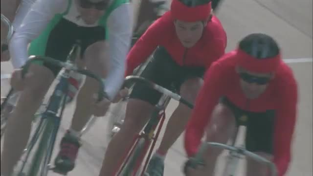 Men cyclists compete in a race.