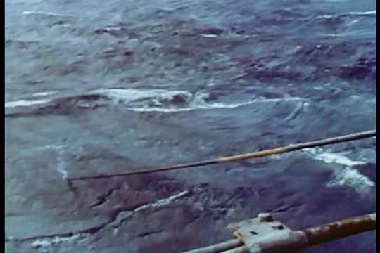 A ship lays underwater cables in 1950.