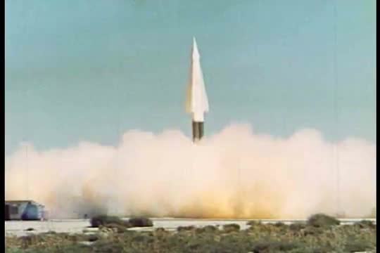 A guided missile launches into space.