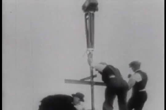 Daredevil cyclists race on an inverted saucer above the city of San Francisco in this 1918 stunt.