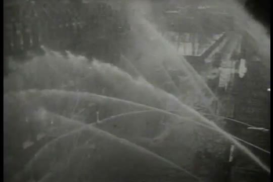 Archival film describing how Western Union telegraph service delivers breaking news of natural disas