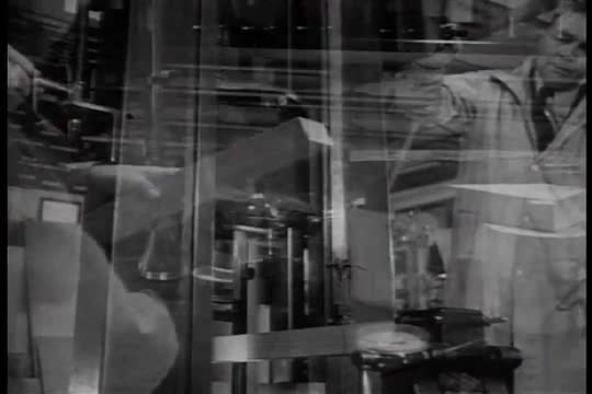 In a Forest Service Laboratory in Wisconsin, chemists work on new ways to preserve wood in 1941.