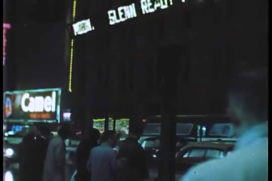 Times Square in New York City in the 1950's with news tickertape billboard display.