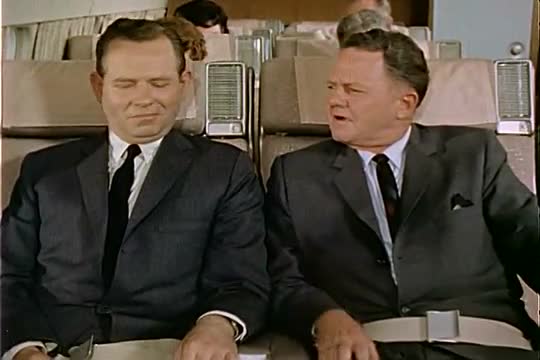 An air traffic spokesman tells a fellow passenger how important the people on airline flights are.
