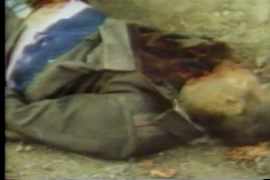 The Mujahideen in Afghanistan kill Soviet troops and strip them of their identity cards and possessi