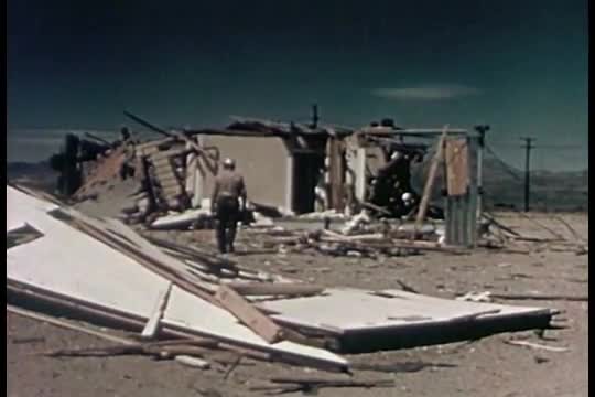People are allowed to walk up and touch the results of an atomic bomb explosion in the 1950s.
