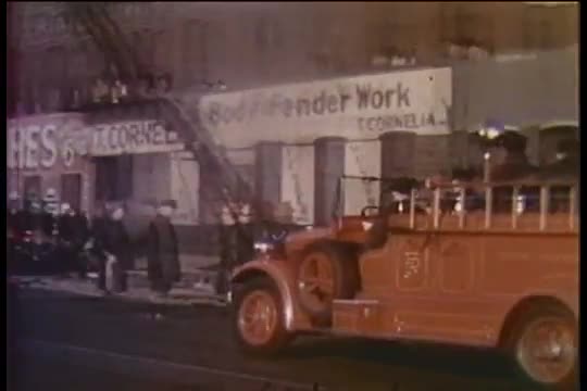 Firemen arrive at a fire in New York City in the 1940's.