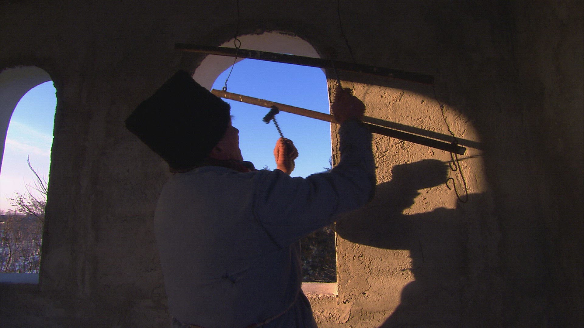 980398880 / Man / Bell Tower / Ringing the Bells / Nanesti / Romania