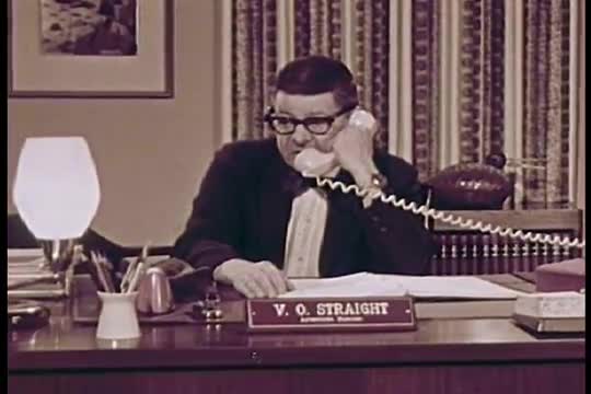 A satiric take on the process of industrial filmmaking in which miscommunication leads to an impossi